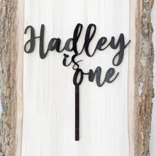 Load image into Gallery viewer, Baby is one cake topper in black acrylic.